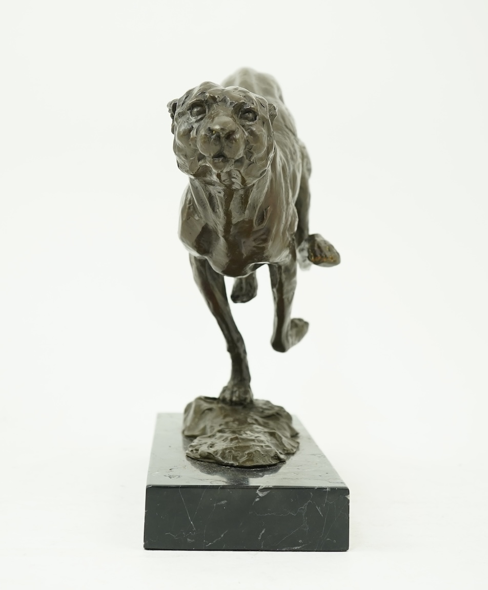 Manner of Mark Coreth (b. 1958): A patinated bronze model of a cheetah in full flight